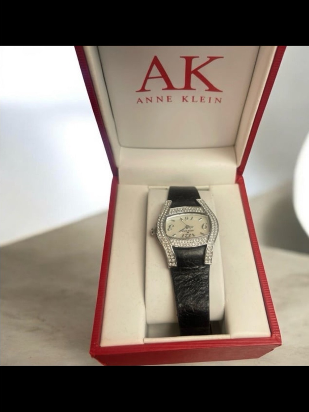 Anne Klein Silver-Tone Crystal Accented Watch with Black Strap